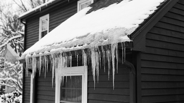 Ice Dam & Gutter Protection in progress at a Missoula, MT property